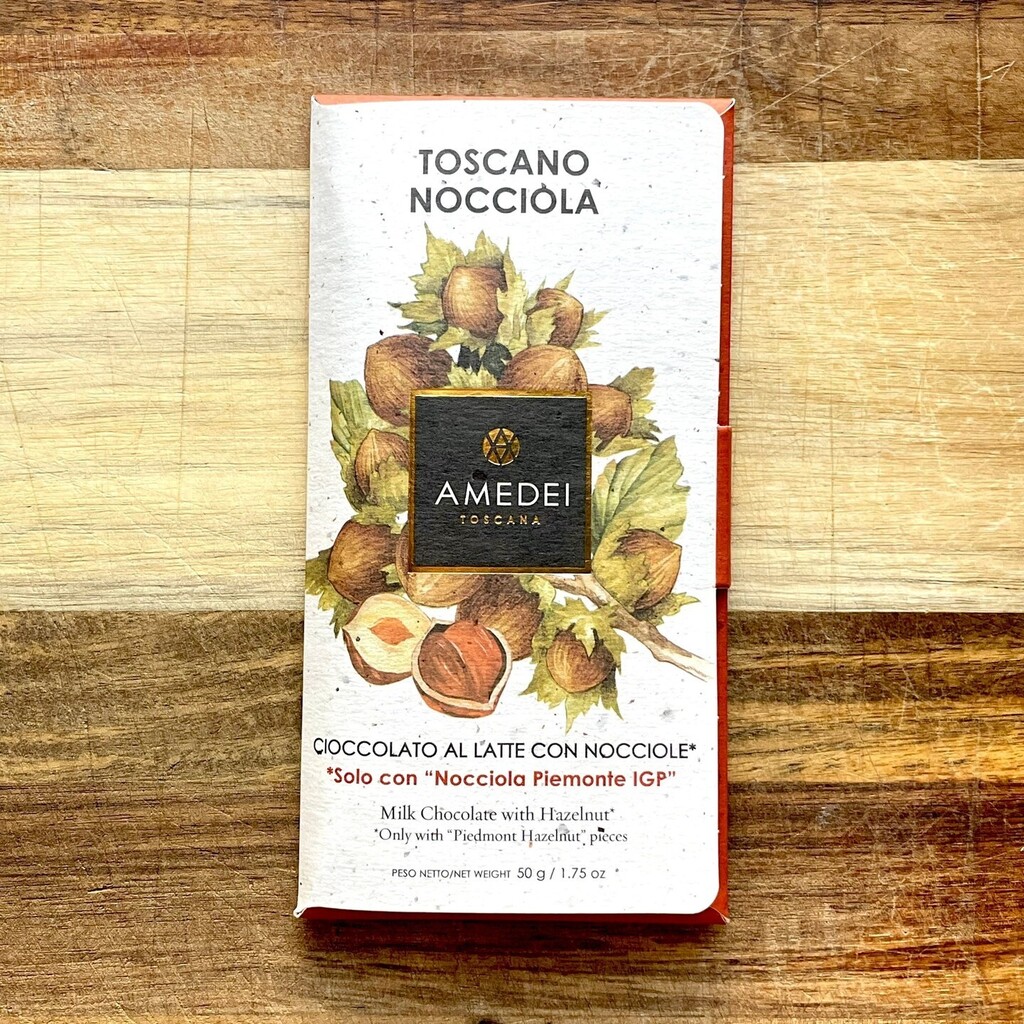 Amedei Tuscan Hazelnut bar is really beautiful. I am an absolute sucker for chocolate/hazelnut combinations and this one doesn't disappoint. It's got a light, creamy 32% milk chocolate base with bits of toasted Piedmont hazelnuts. The toasty, lightly flo… instagr.am/p/C6ROfebNd3i/