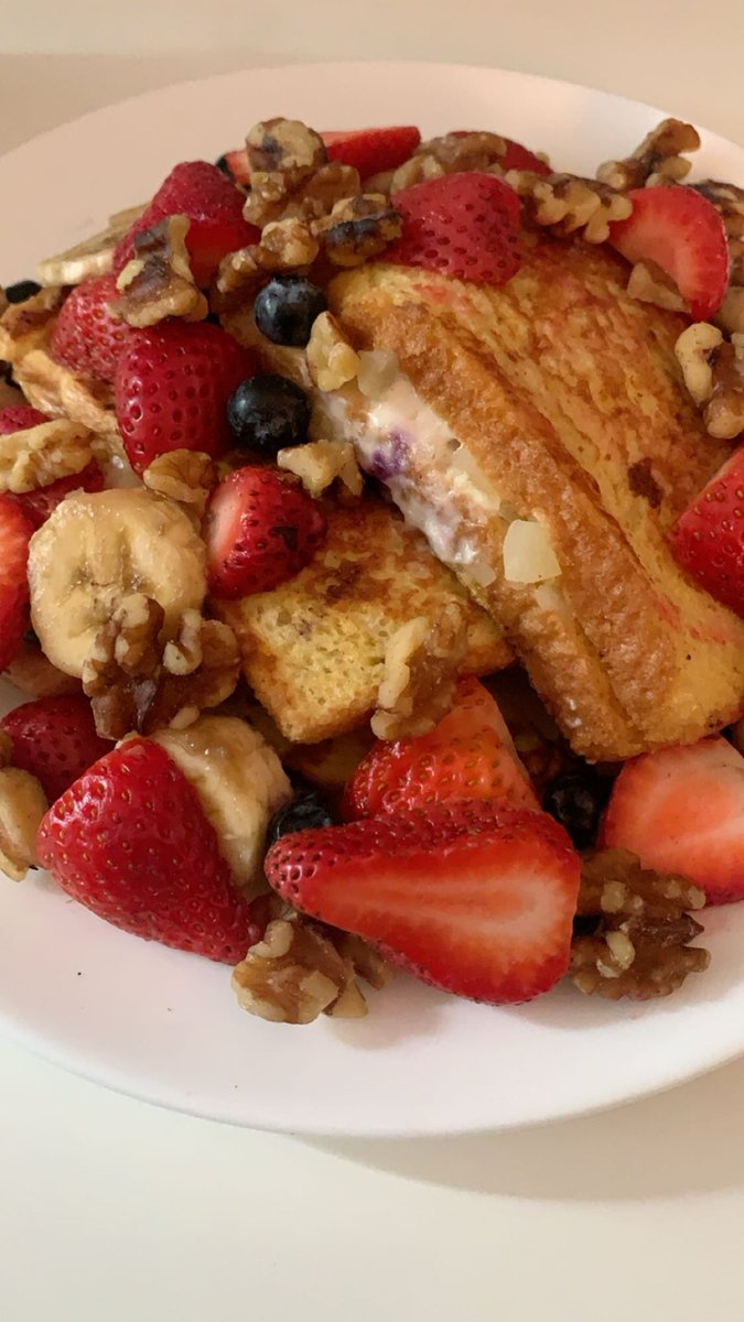 Starting my day off right with a plate full of love! Stuffed French toast loaded with strawberries and blueberries? Yes, please! #BreakfastGoals #StuffedFrenchToast #Berrylicious #MorningDelight #FoodieAdventures #TakingANapAfter #FuelForTheDay