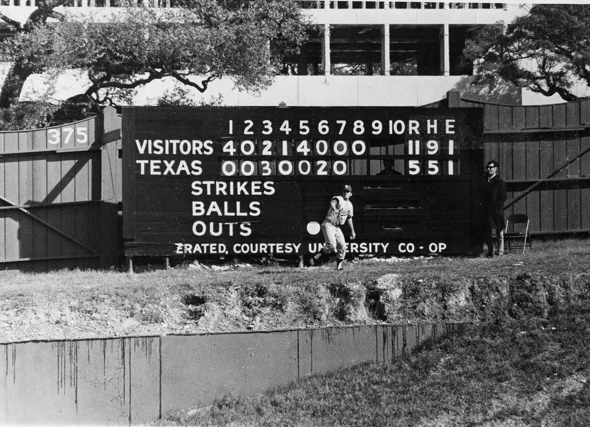 1972: At @UTAustin's Clark Field no. 2 - where the Bass Concert Hall is today - the outfield scoreboard was manually operated. A push-button transmitter behind home plate was used to relay ball and strike counts, and runs, to a receiver at the scoreboard, which was then updated.