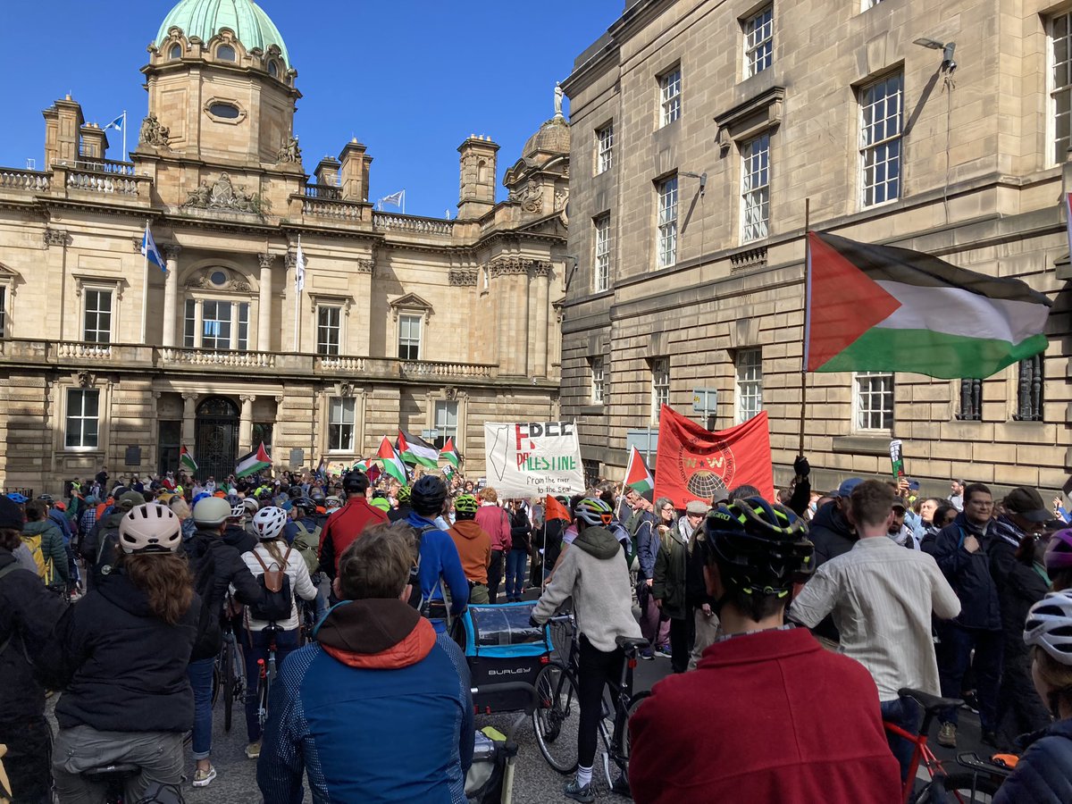 When two demos meet - lots of mutual support and ringing of bells for both causes. @EdCriticalMass and #FreePalestine today in #Edinburgh.