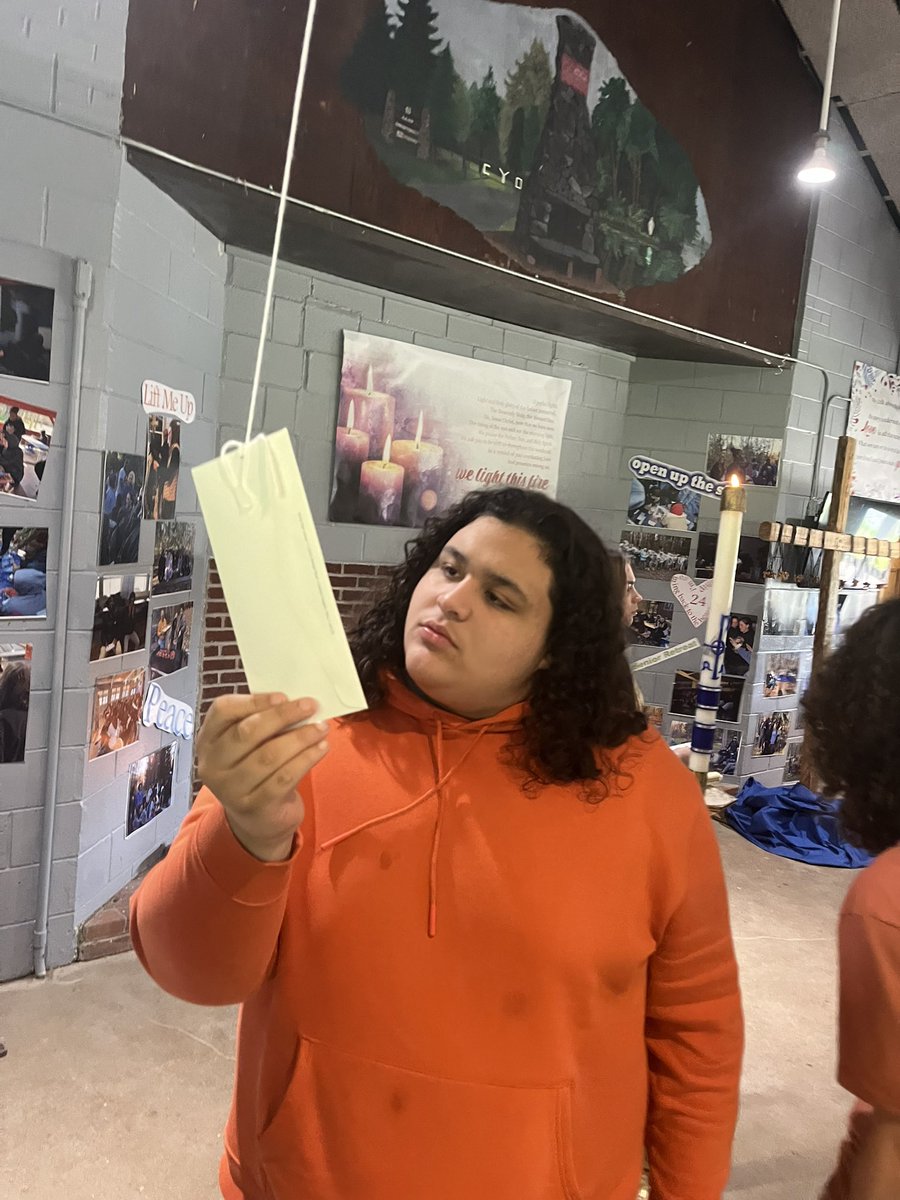 Seniors heard from all the faculty and staff during opening prayer and then they retrieved a letter hanging from the rafters to remind them of where they were themselves 4 years ago… @campchris1924 @dioceseofcle