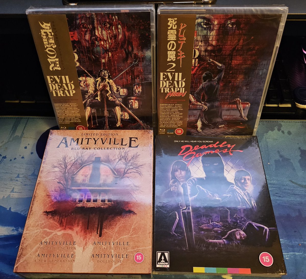 RyanActually1's tweet photo. Some of my goodies I picked up away for a couple of days. Don't have any shops that sell games or dvds/blurays where I live so got to make the most of the shops when I do get to visit the city.
Blurays :
#EvilDeadTrap
#EvilDeadTrap2
#DeadlyGames
#AmityvilleBluRayCollection Limited Editon Boxset
Games :
#Returnable
#GodOfWarRagnarok
#RatchetandClankRiftApart
#StellarBlade
I'm home now , within the last 30mins. I'm knackered so going to bed. Will sort out the physical games giveaway tomorrow.