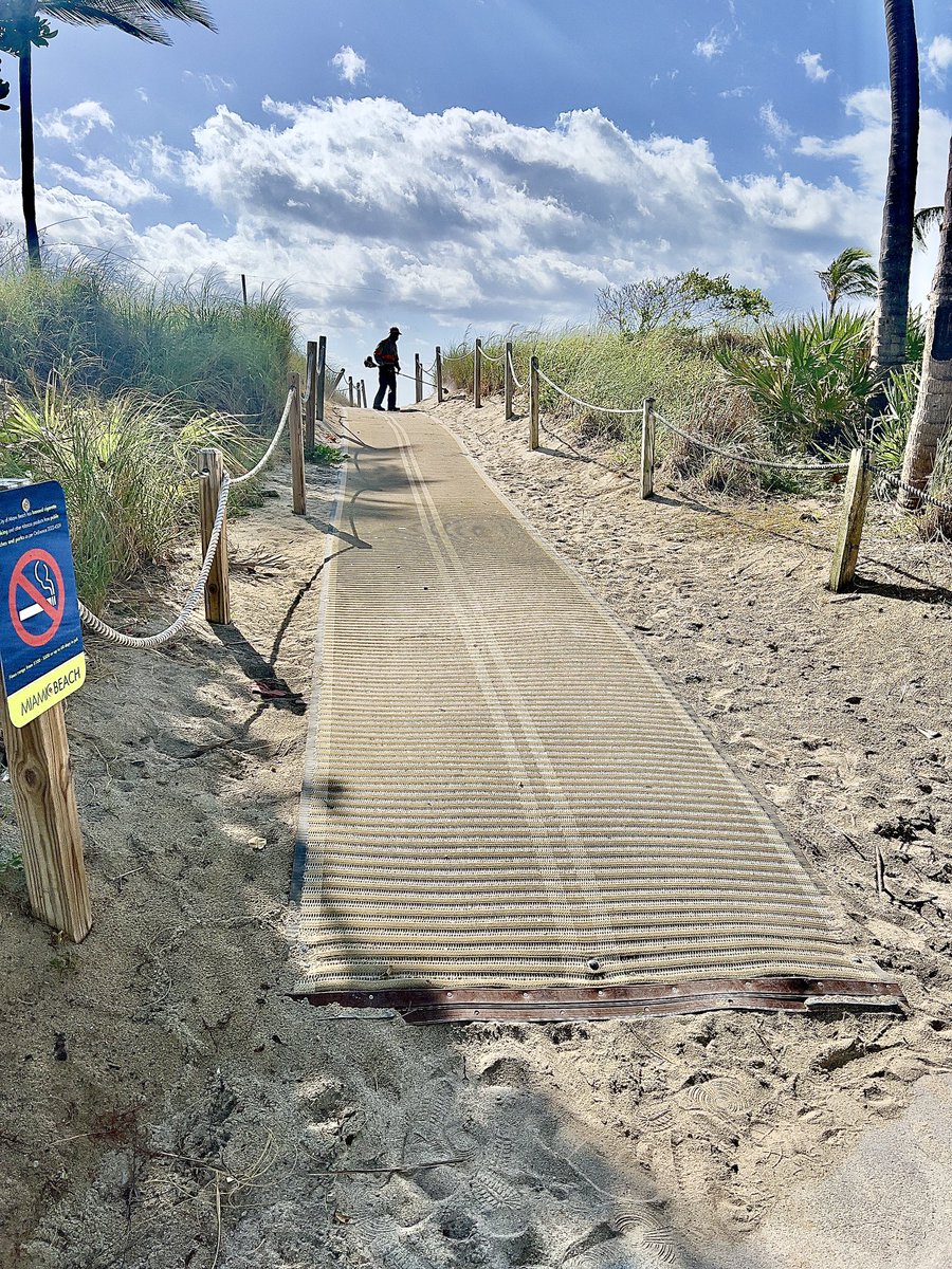 If you build it like a careless afterthought, they will not come. Big gap between beach walk at access ramp—Miami Beach. Incline is way more steep than one inch rise per one linear foot. Lazy check the box design never serves wheelchair users #DisabilityInclusion #UniversalDesign