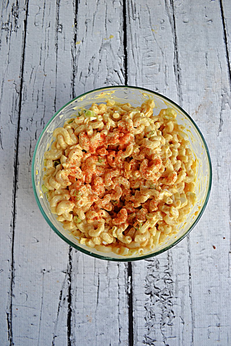 Looking for a new side dish for summer cookouts and BBQ's? Deviled Egg Pasta Salad is a tasty summer salad with a deviled egg dressing that makes a simple summer side! #pasta #salad #eggs #deviledeggs hezzi-dsbooksandcooks.com/deviled-egg-pa…