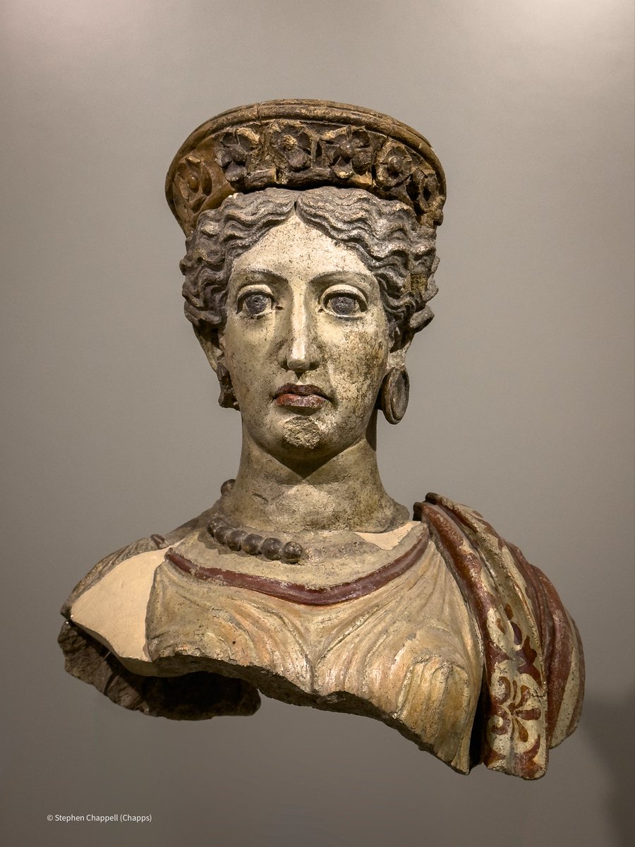 This startling painted terracotta bust of the goddess Juno is from the Faliscan Sanctuary of Juno Curitis in Celle. She was made to be seen in the round (she was once a complete statue), and was probably displayed in the cella of the temple. #polychromy c. 380 BCE 1/