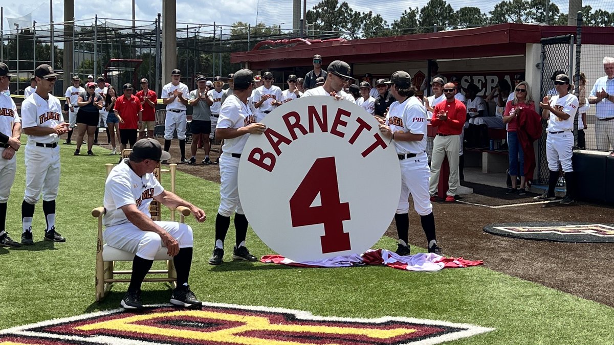 Dave Barnett getting his jersey number retired and the college naming the road here Dave Barnett Way.