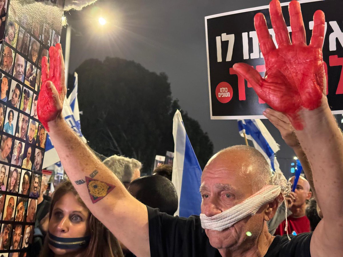 'Don't let him abandon (them)' - Begin road in front of the Kirya IDF Military Headquarters in Tel Aviv, in calls for the release of the hostages. Credit: Vardit Alon-Korpel