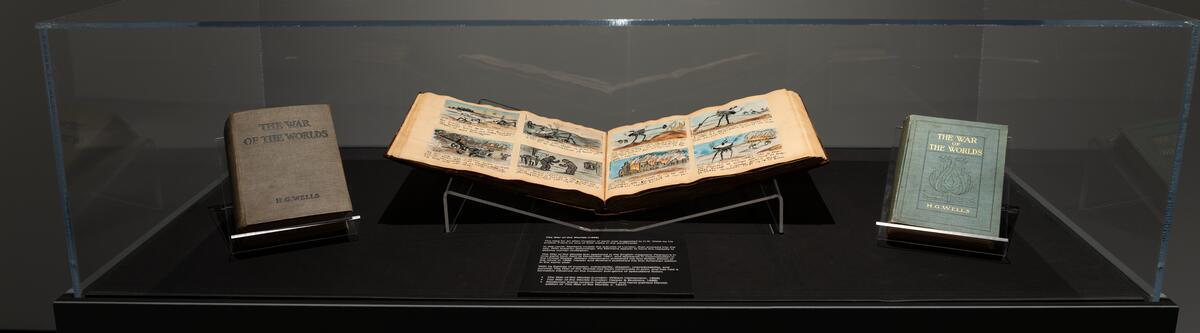 W is for The War of the Worlds The War of the Worlds is Wells' most well known novel, about a Martian invasion of Earth. The exhibit @nicklegalleries includes a Danish handwritten, hand-painted, graphic novel adaptation of the book. ow.ly/JuIR50Rptqj #HGWellsUCalgary