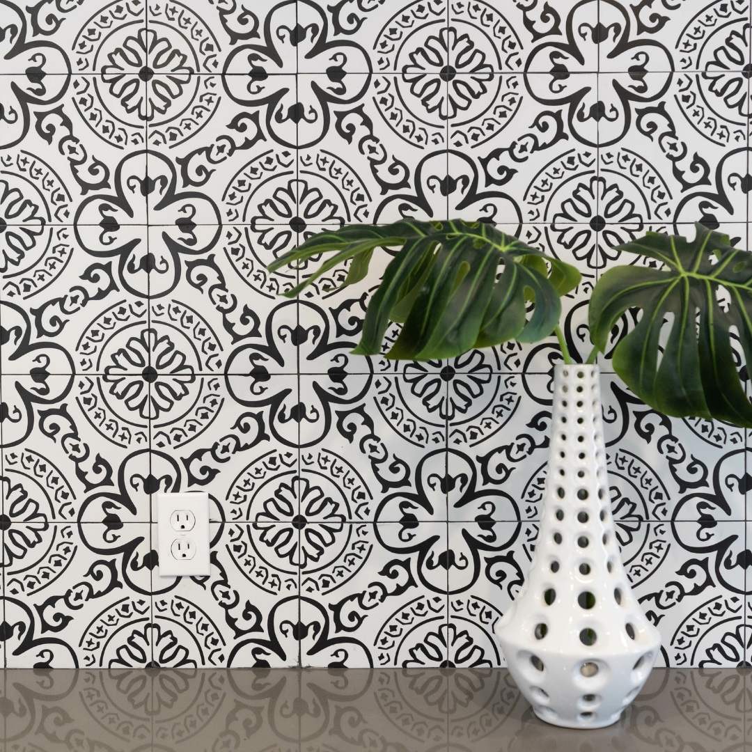 You can easily spice up your kitchen with a patterned tile backsplash, but is this too busy?