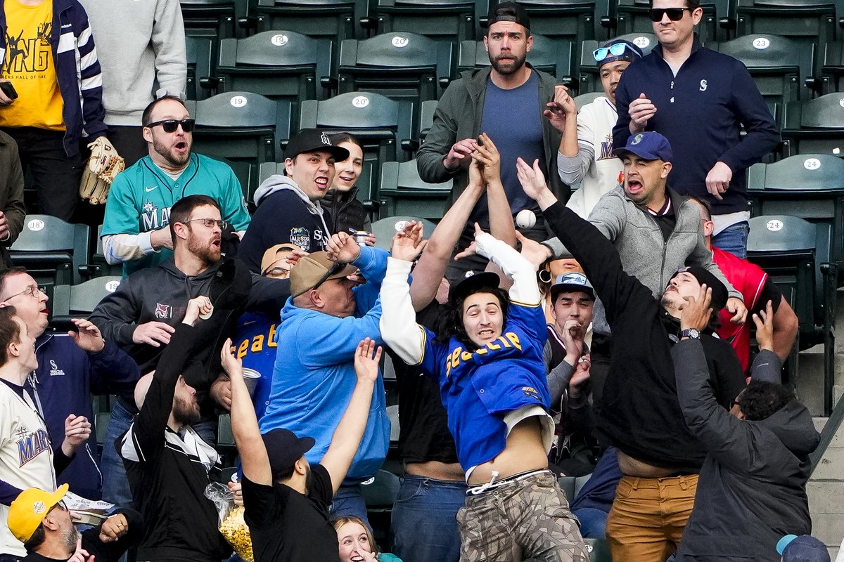 Ah, the tapestry of faces when a ball ends up in the stands... fans vying for the home run ball from Seattle #Mariners' Josh Rojas during the 6-1 win against the #Diamondbacks yesterday.