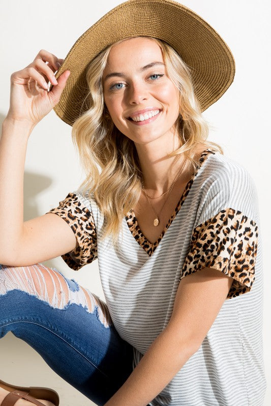 Unleash your wild side 🐾 with our STRIPE ANIMAL PRINT MIXED BOXY TOP! Made in the USA, this casual yet bold top combines comfort and style seamlessly. Get yours now for just $31! ✨ Shop here: shortlink.store/iruwmw3210ms #newarrival #Tunics #womenstop