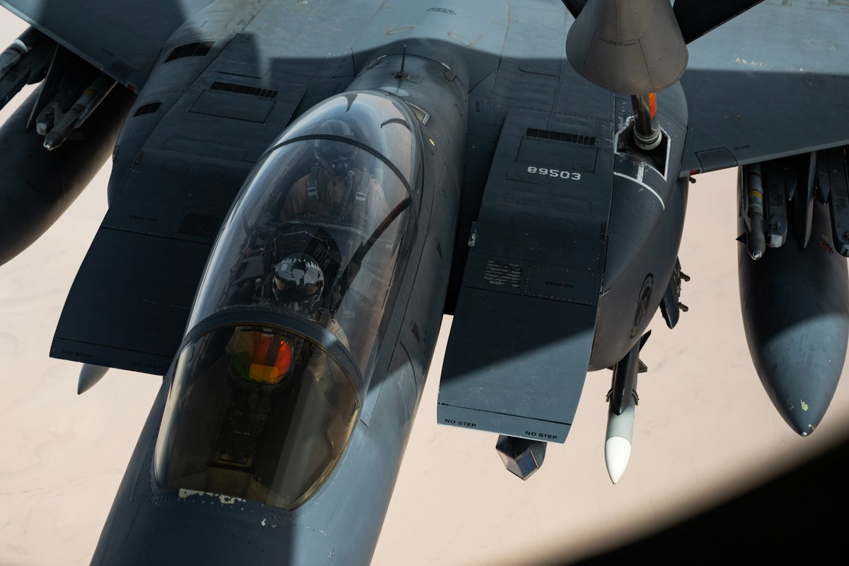 A U.S. Air Force F-15E Strike Eagle receives fuel from a KC-135 Stratotanker over the U.S. Central Command area of responsibility. The F-15 is deployed within the CENTCOM area of responsibility to defend U.S. and coalition interests, promote regional security, and deter potential…