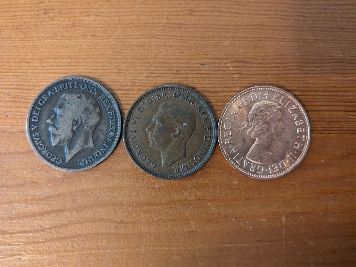 AsTragedy's tweet photo. A 🧵 of some coins from my collection! 
Starting with the UK: three pre-decimalization pennies featuring George V, George VI, and Elizabeth II https://t.co/k1jlnF29Cf