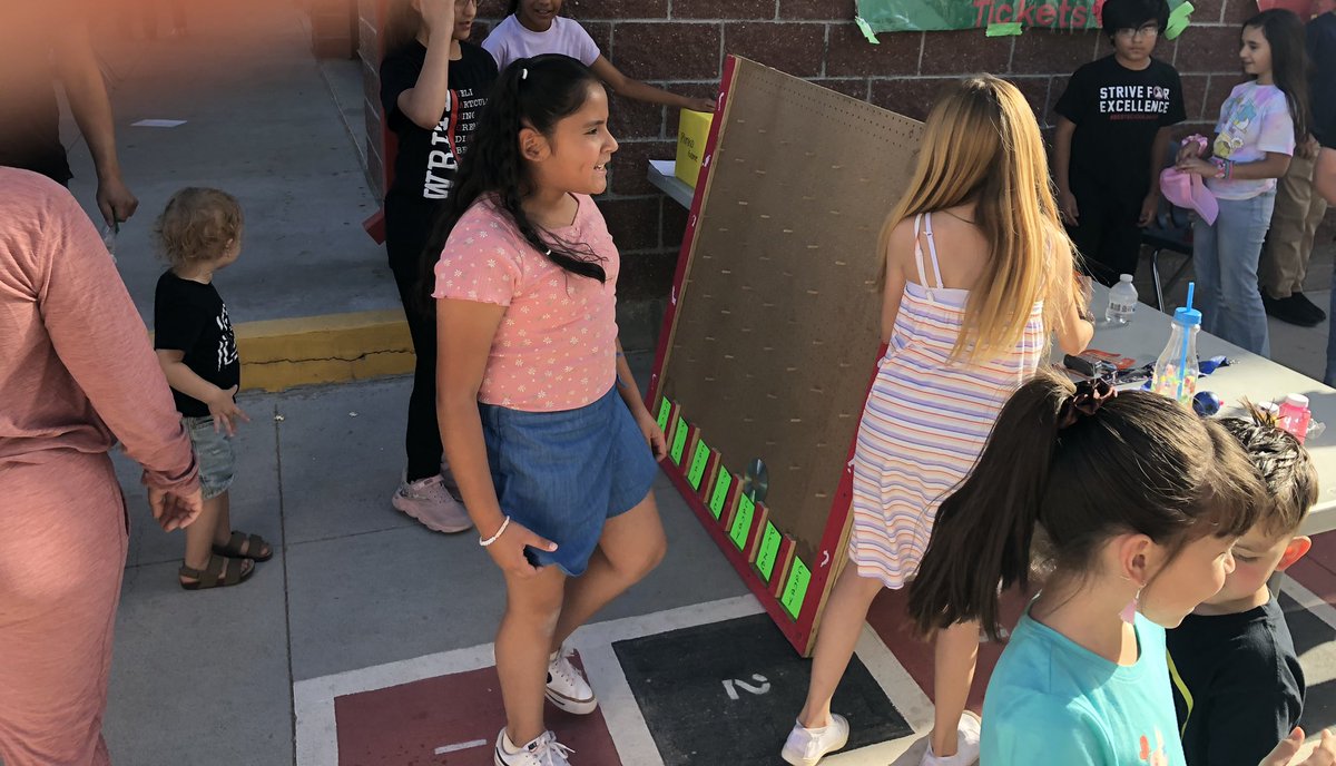 It was a beautiful afternoon for our NEHS members to enjoy running their Plinko and Bowling booth at our Spring “Día deLis Niños” Carnival.