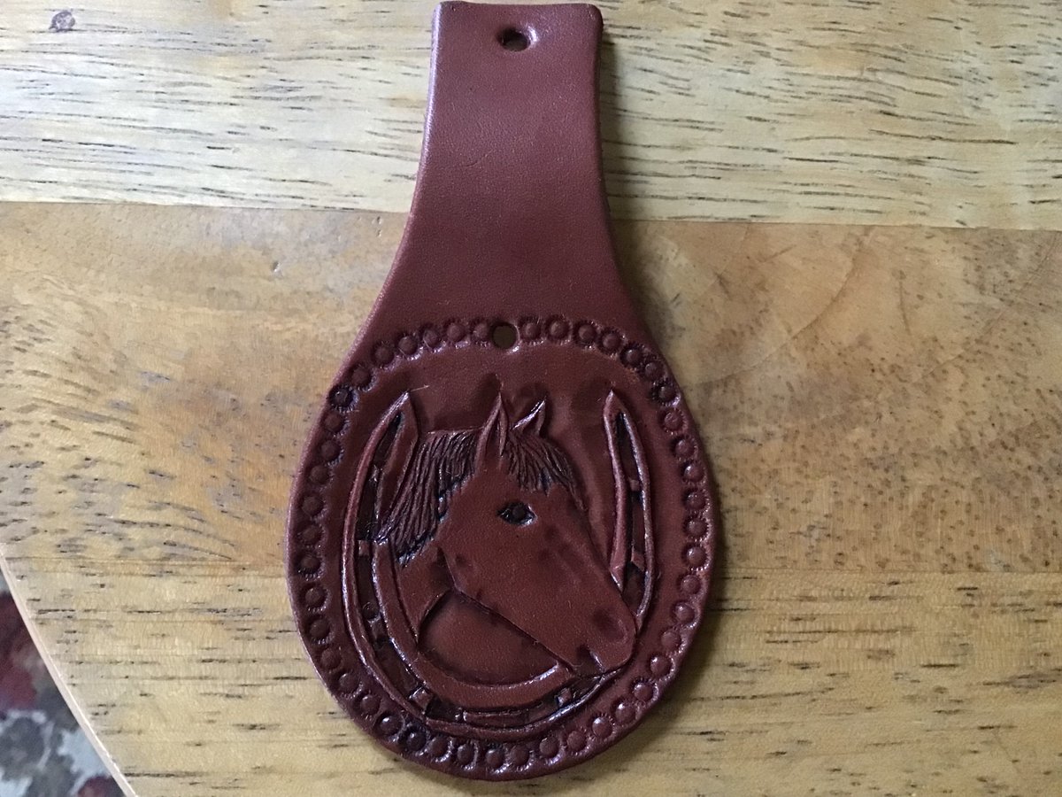 Here’s some leatherwork Teresita just finished carving and stitching: