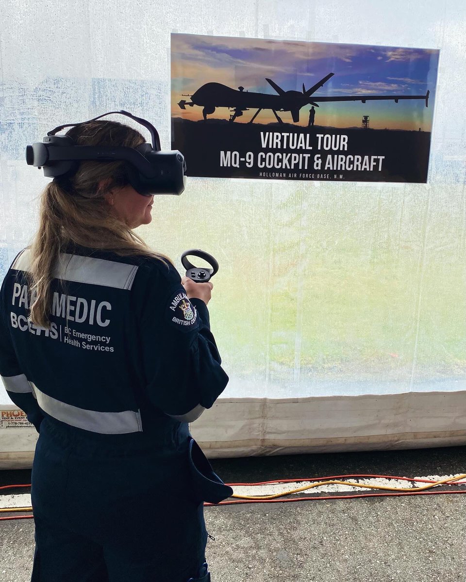 BCEHS Critical Care Paramedic Christa Renneberg taking a virtual tour of the MQ-9 Cockpit & Aircraft! #emtwomen #genderdiversity 
#stem #womeninstem #stemgirls #stemcareers #ehs #womanparamedic #bcehs