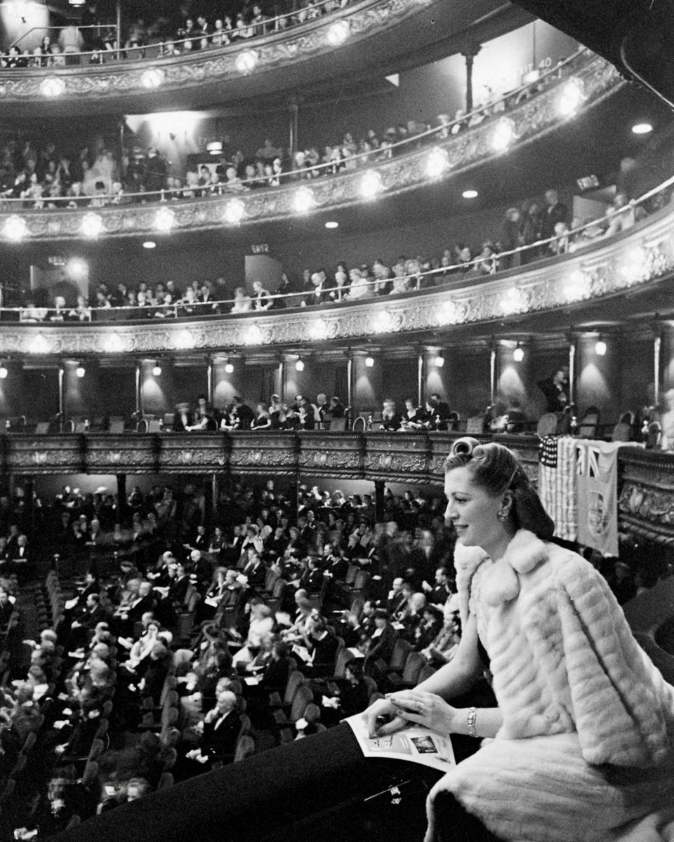 A woman attending the Metropolitan Opera's 61st season in New York City, New York, 1944. (📷 Alfred Eisenstaedt/LIFE Picture Collection) #LIFEMagazine #LIFEArchive #AlfredEisenstaedt #MetropolitanOpera #Season #Performance #1940s #NYC #NewYork