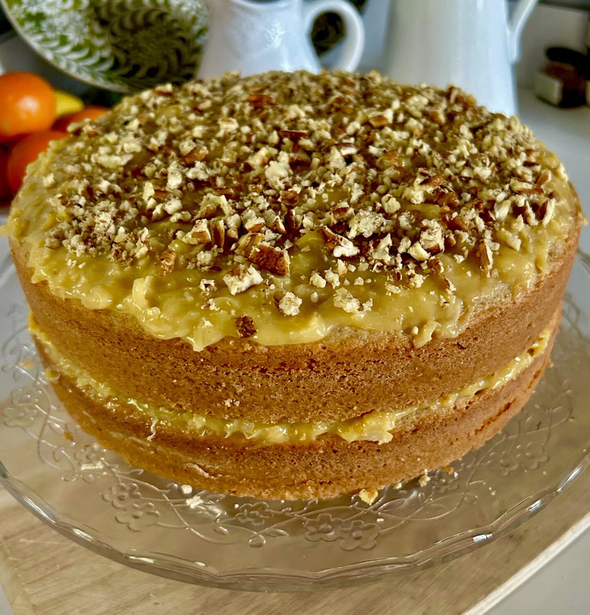 After legs at the gym & lunch, it was yard work, a nap, Moroccan chicken w/lemon & olives for dinner, and then 100 pushups before I slice into this coconut-pecan cake I made. Used only half the sugar the recipe called for. #weekenddessert