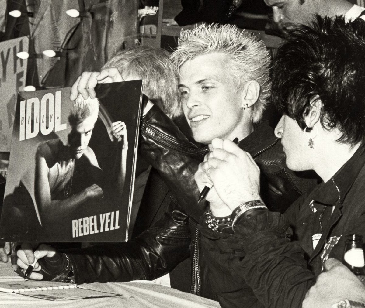 Billy Idol and Steve Stevens at a promo signing for Rebel Yell in Hollywood, March 1984, photographed by Ron Galella. And below in a video for the expanded re-release… Still rocking it to the max! ✊🏻 #IdolSunday #BillyIdol #RebelYell