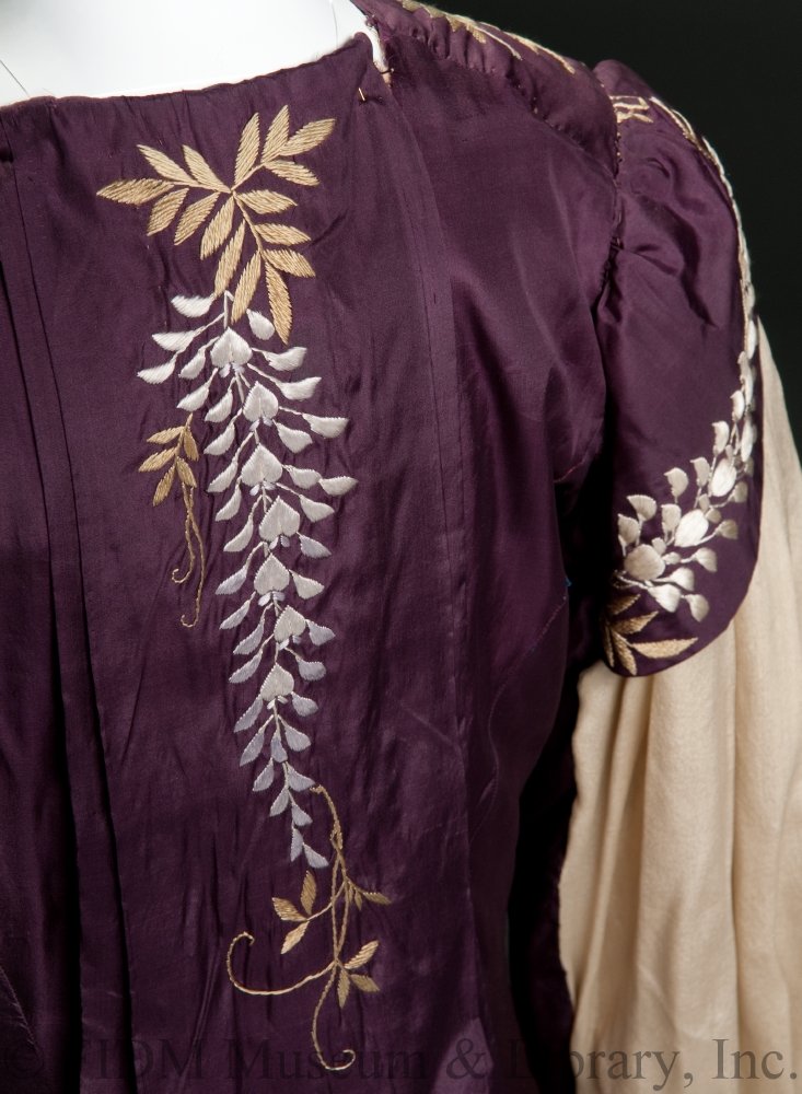 Elegant At Home/ Tea Gown, 1887-89. Aubergine silk taffeta, silk crepe & silk embroidery floss creating motif of wisteria flowers. ©️ @FIDMMuseum #FashionHistory