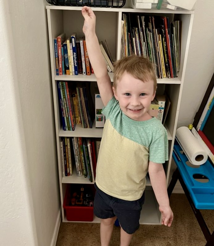 My 4 year old grandson, who began to read before he was 3, finally got his own bookcase.  He's so proud.