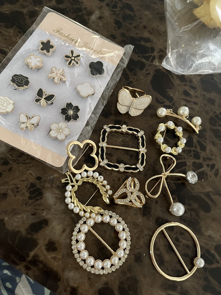 ive becoming obsessed with scarf rings and brooches