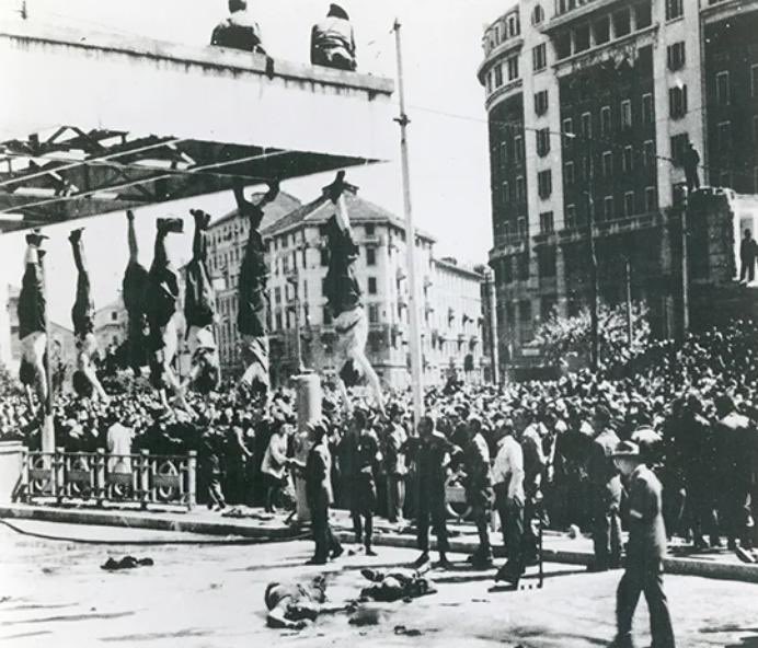 Brutal Death Of Fascist : 79 years ago, Benito Mussolini, a great dictator of Italy, was executed today. He was shot by Walter Audisio, a communist partisan and was hanging upside down by the communists.