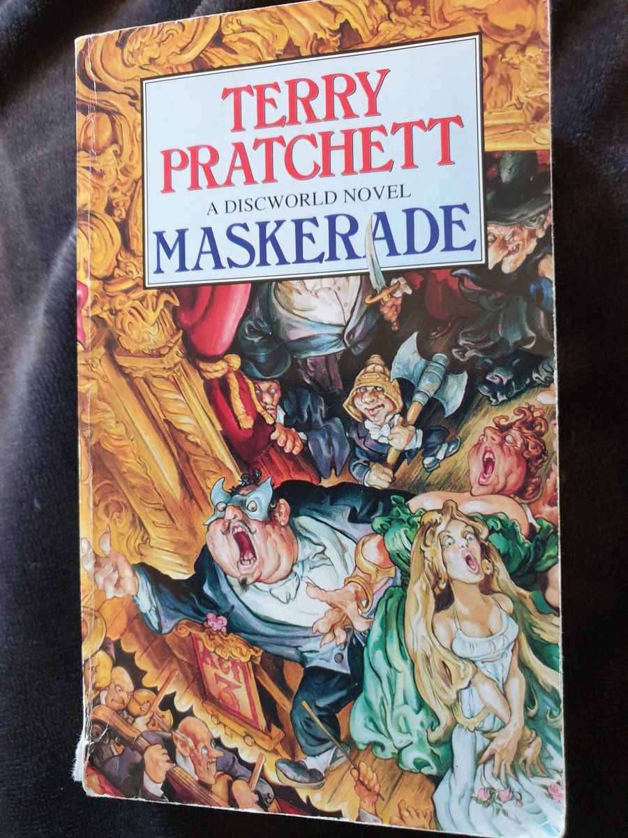 Happy #TerryPratchettDay! Pratchett was one of the authors who made me want to be a writer. Here's my very old, much-loved copy of Maskerade, the first Discworld book I read ❤