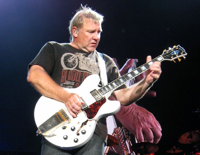The battle over and the dust is clearing
Disciples of the Snow Dog sound the knell
Rejoicing echoes as the dawn is nearing
By-Tor in defeat retreats to Hell
Snow Dog – is victorious
The land of the Overworld is saved again

#Rush #AlexLifeson #LifesonDay