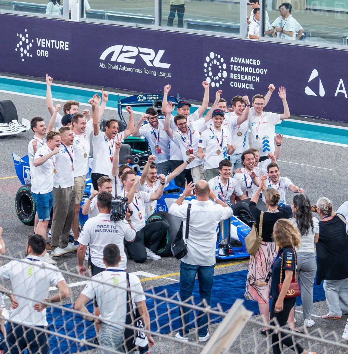 🏆 Team TUM overcame every hurdle and won the world's largest extreme autonomous race yesterday at Yas Marina Circuit! 🥂 Cheers to the engineers and coders that made this victory possible. #A2RL #ASPIREUAE #AutonomousRacing #Innovation