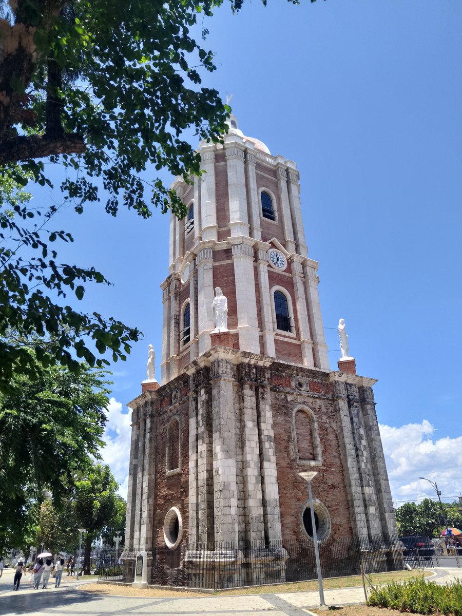 It's located in front this beautiful belfry and Jaro church.