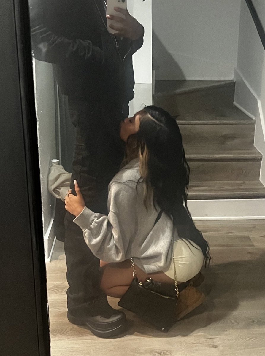 On her knees, she sees the D's