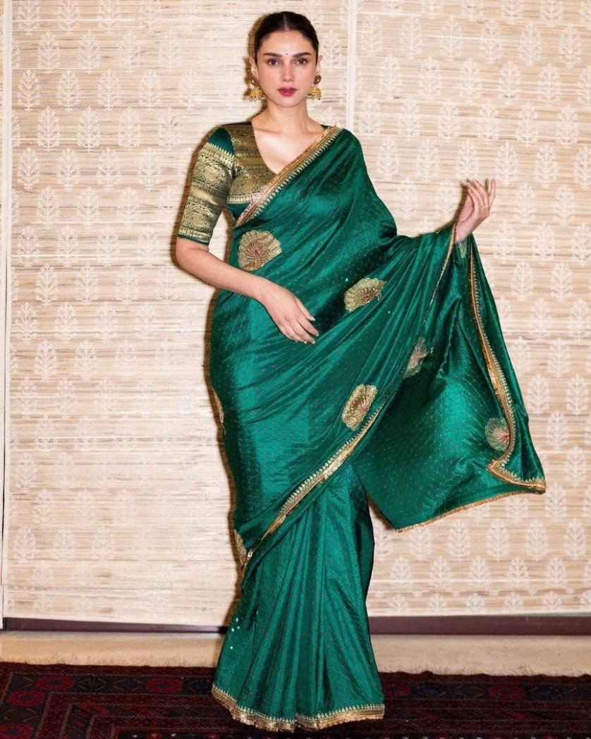 #AditiRaoHydari mesmerizes in a green saree paired with a golden blouse, radiating elegance and grace in her latest pics! 💚✨❤️‍🔥🦋 . . . . #AditiRaoHydari #SareeBeauty #GoldenElegance #talkingbling