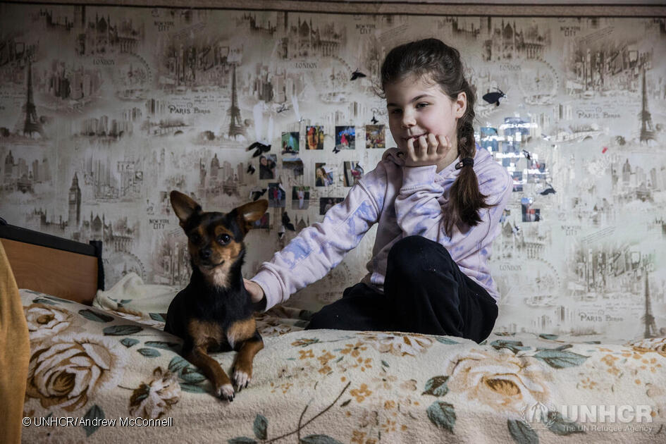 Meet Victoria and her furry friend Skya 🐶 With her brother and mother, she stayed in a collective site for people displaced by the brutal war in Ukraine. When their mother died, @UNHCRUkraine & @R2Protection supported Victoria's great-grandmother to become the legal guardian.