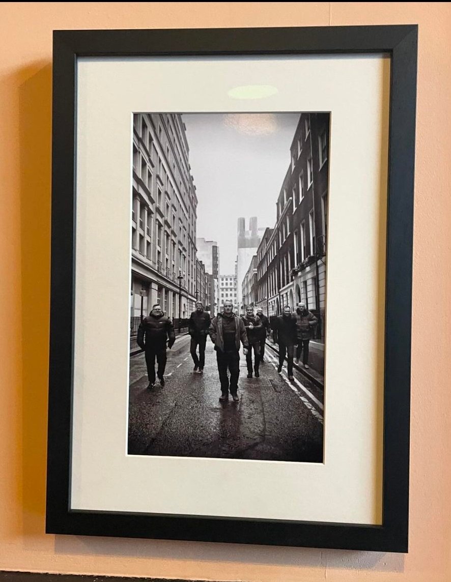 MenkFeck's tweet photo. Thanks to Jo at the @wigancentral for letting us hang this picture permanently and to Sara at @artisanframing2 for doing such a great job framing it.

To absent friends.

Enjoy yourself it's later than you think.

#wafc https://t.co/ucBStmXMby