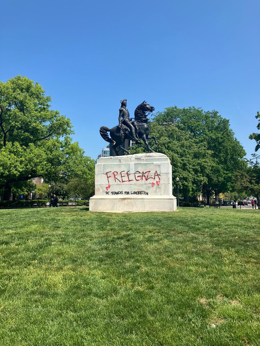 Sent from @GWtweets: Protesters have defaced the statue of George Washington at the edge of campus.