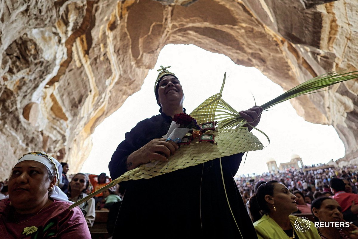 AmrDalsh's tweet photo. A #Coptic #Orthodox #Christian attends a Palm Sunday mass at the Samaan el-Kharaz Monastery in the Mokattam #Mountain area of #Cairo, #Egypt, April 28, 2024. #REUTERS/Amr Abdallah #Dalsh https://t.co/uvGNYbe0zv