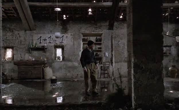 guneybirtek's tweet photo. Tarkovsky'nin Nostalghia filminde duvarda 1 + 1 = 1 yazısı görürüz. 1 damla 1 damla daha 2 damla etmez, daha büyük 1 damla eder, su birbirine karışır büyür... https://t.co/FrmBNTRr3b