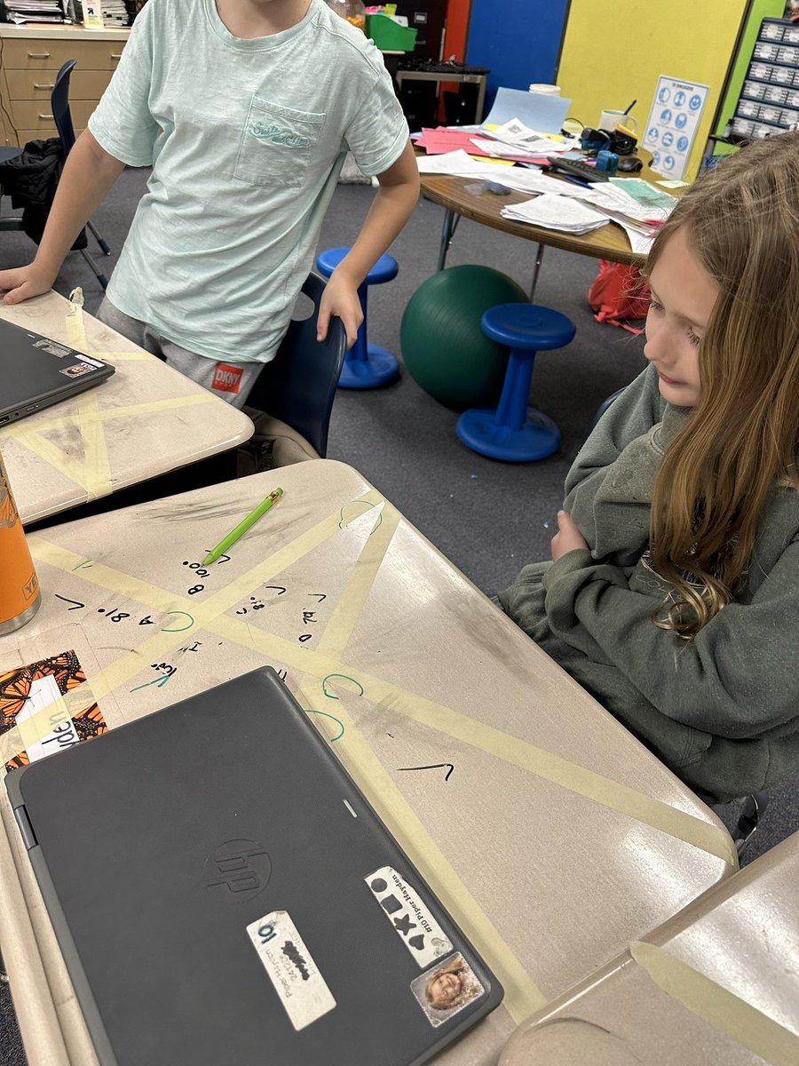 MrsJuracko's tweet photo. With many intersecting lines made on their desks, students labeled angles &amp; measured them to practice measuring to the nearest 1 degree. Then their buddy checked them &amp; provided feedback. Such a fun way to practice! 💙💛@MtHopeNanjemoy @MikeHoffmanCCPS https://t.co/jYlh4sOU4u