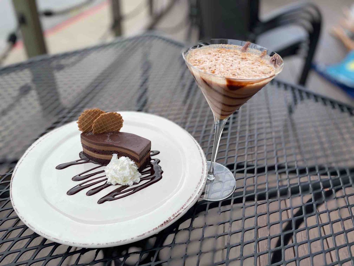 Treat yourself! Our Peanut Butter Cup Martini - Skrewball Whiskey, Mozart Chocolate Creme, creme de cacao & a dash of creme topped with crushed butterfingers. REEL Chocolate Cake – Layers of devil’s food cake & dark chocolate mousse, topped with a decadent dark chocolate ganache