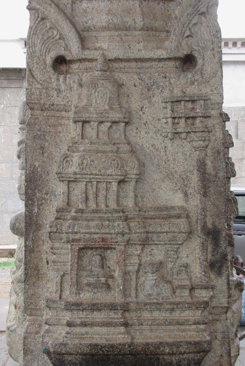 Isnt this interesting? A sculpture of a vimanam of a temple, with the Nandi, bali-pitham and dvajastambham in front, all minutely carved. On a pillar in the Bhaktavatsala temple, Thirukkazhukundram, Tamil Nadu