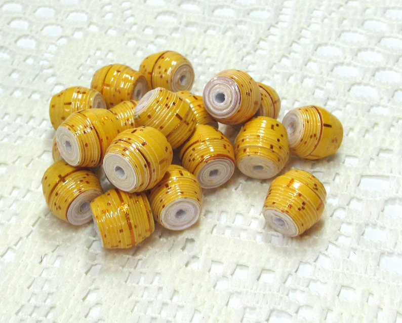 Paper Beads, Loose Handmade, Jewelry Making Supplies, Shorty Barrel, Bright Yellow with Specs of Red Metallic etsy.me/4aVd0PH via @Etsy #paperbeads #handmadebeads #springbeads #jewelrymakingbeads