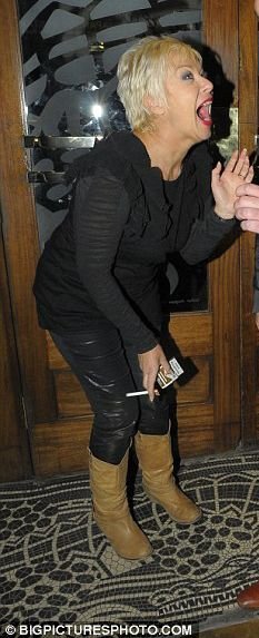 Denise Welch
Holding Pack of Marlboro Cigarettes in her Right Hand 
Cigarette also in her Right Hand