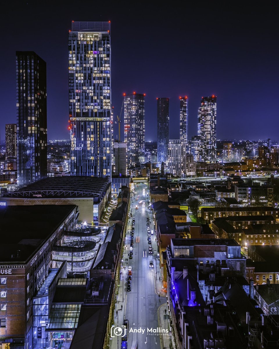 Heading down Deansgate at night. 📸 | @andymallins