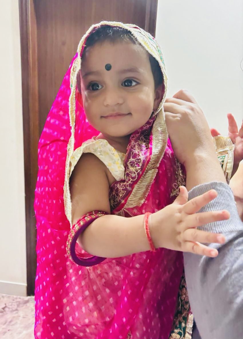 This is my Dearest Dearest Granddaughter AHILYA RANI who loves to pose at age 1.2 ! Forever smiling with dimples and we all dote on her ! A born ⭐️!