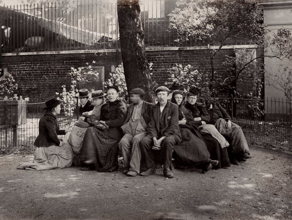 Homeless people in Itchy Park, Spitalfields.

Jack London.

1902.