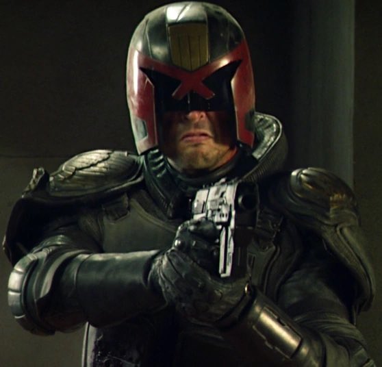 Both Judge Dredd movies understood that the comics being a satire is lame and shooting criminals in the face is much cooler and badass