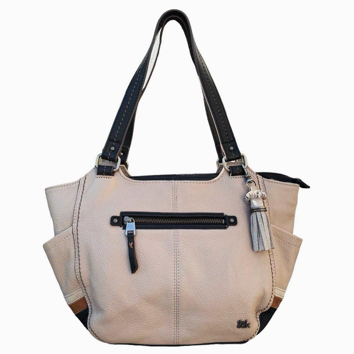 The Sak Kendra Hobo Tote Tan Brown and Black Shoulder Bag with a Fob. Just Listed in Depop and Poshmark Stores. 

Follow Depop and Poshmark Stores in Bio: #vintagebags #thesak #leatherbag #leather #bag #handmade #fashion #leathergoods #leathercraft #bags #handbag #leatherbags