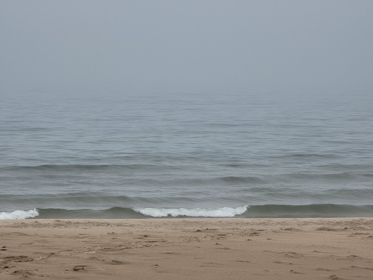 Drizzly and foggy morning walk. 
#lakemichigan #grandhaven #lakelife