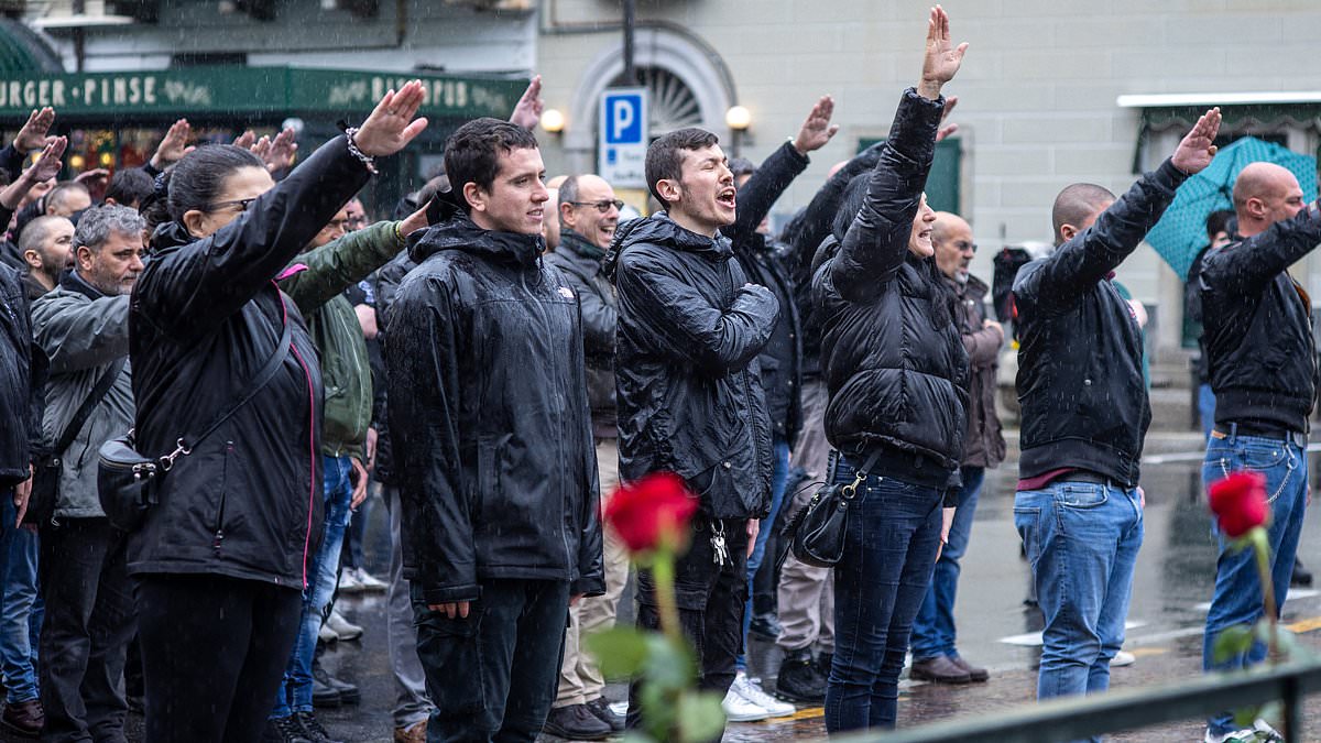 Horrifying moment dozens of Italian men give fascist salute on anniversary of dictator Benito Mussolini's execution trib.al/rn6YI0E